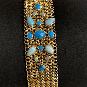 Lia Sophia Gold Bracelet with turquoise insets.